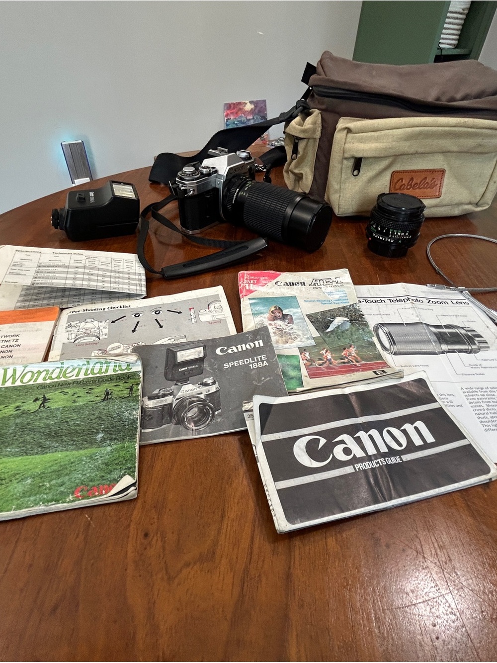 Canon SLR AE-1 Film Camera Kit w/ Telephoto & 50 mm lenses, flash & OG paperwork